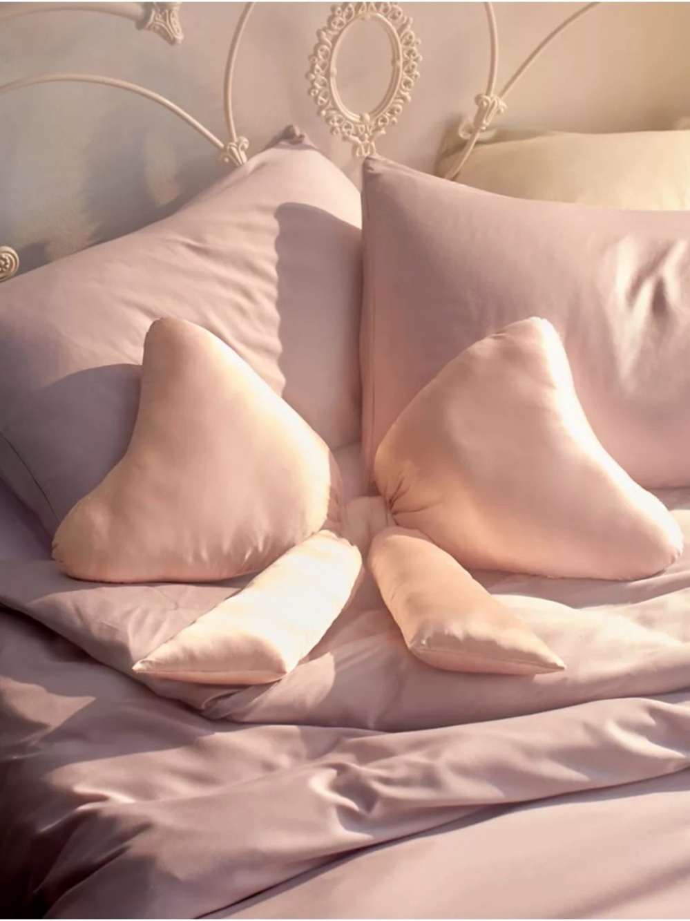 Urban outfitters Big Bow Satin Throw Pillow in ballet slipper